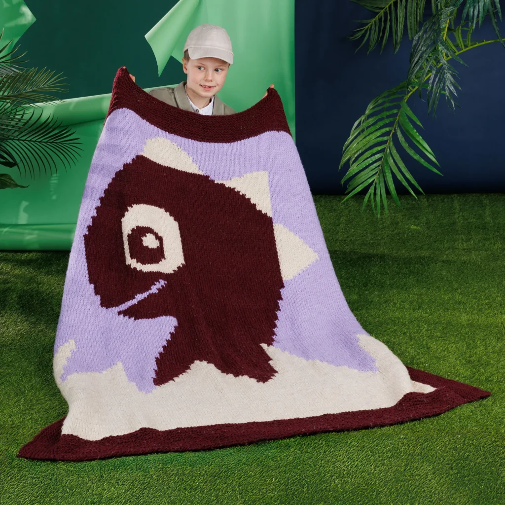 Hatching Dino Knit Blanket