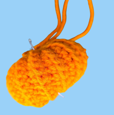 Striped crochet pumpkin with two colors