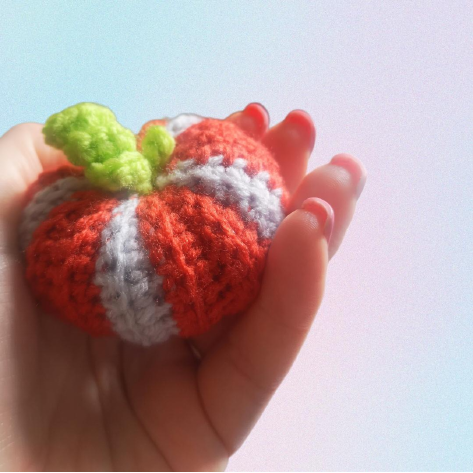 Pile of finished crochet pumpkins