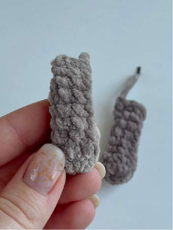 Two crocheted arm pieces for the bear