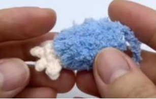 Sewing the ear pieces together.