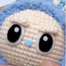 Gluing the felt teeth onto the mouth.