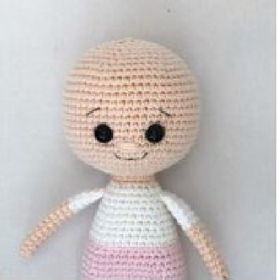 Crochet doll head with embroidered nose