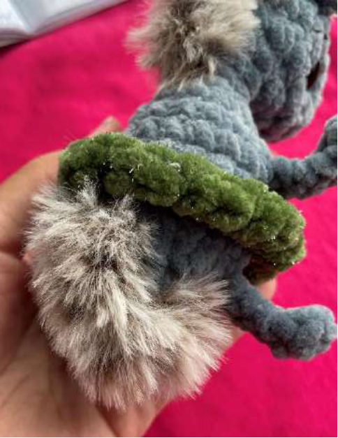 Another view of the finished decorated Igogoshka crochet horse