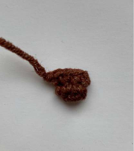 Close-up of crocheted tail in progress