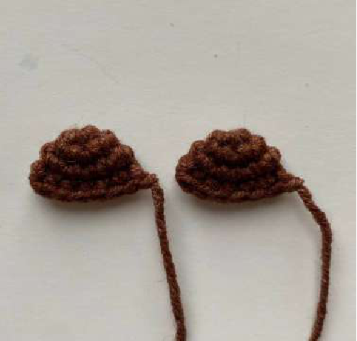 Close-up of crocheted bear ears