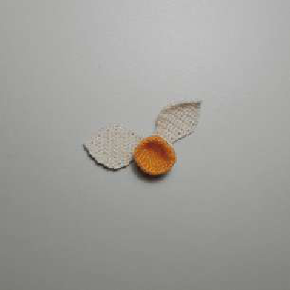 Checking the finished flower head assembly