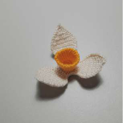 Sewing a leaf to the stem