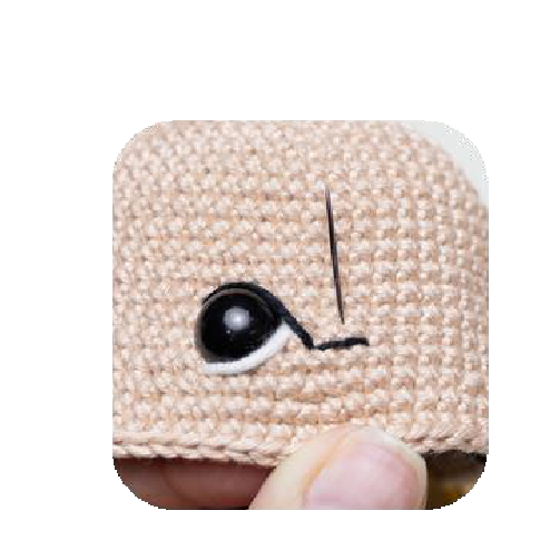 Another angle of embroidered eyes