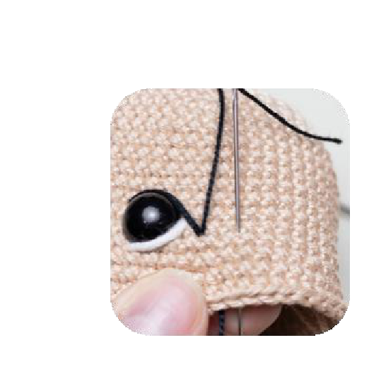 Preparing to embroider next eye details