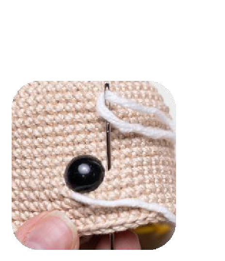 Marking eye placement for amigurumi doll