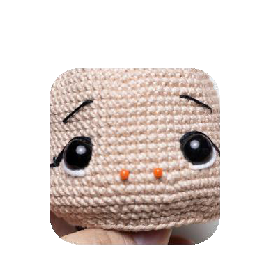 Embroidering doll's nose