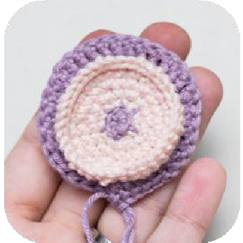 Crocheting through both wing layers