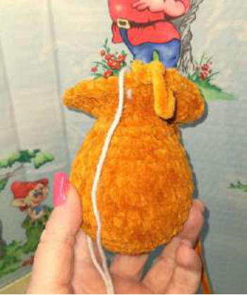 Small crocheted ear piece for the bear.