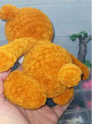 Using a needle to create indentations for the eyes.