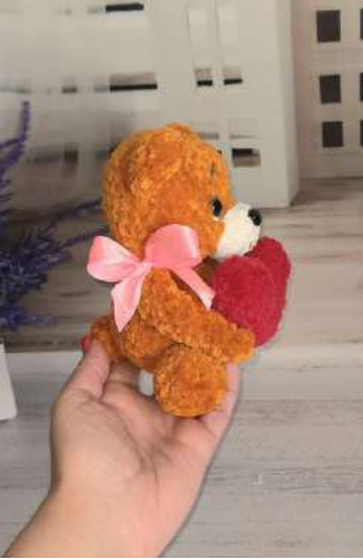 Angled view of the cute plush bear.