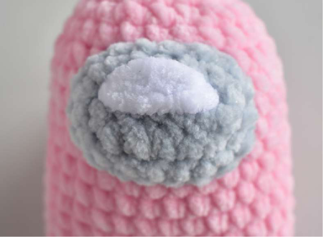 Crocheting the porthole for the cosmonaut