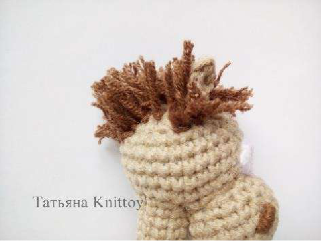 Attaching mane strands