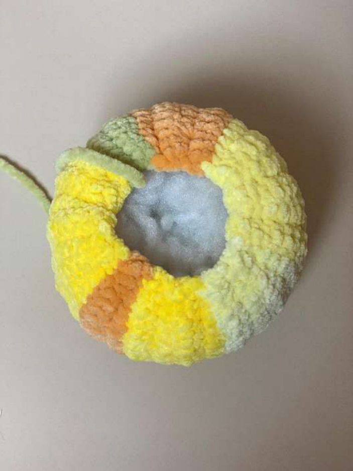 Stuffing the pumpkin with fiberfill