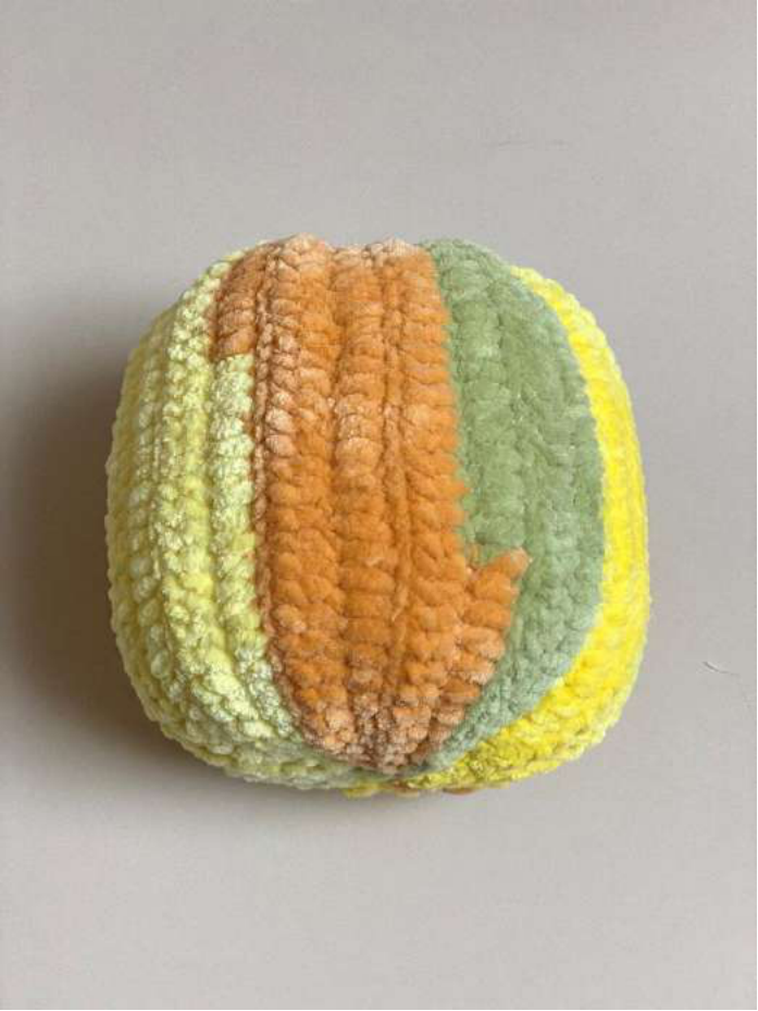 Cinching the top of the pumpkin