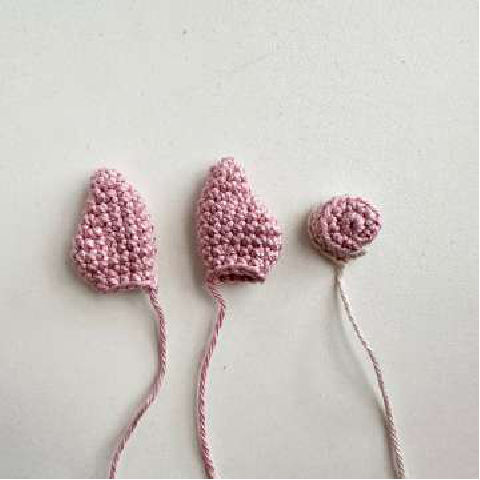 Crocheted piglet ears and nose piece
