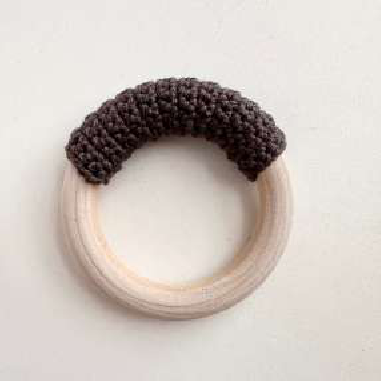 Two crocheted piglet arm parts with bobble stitch thumbs