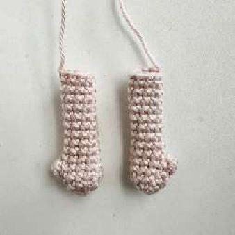 Crocheted clamp sewn around a wooden ring